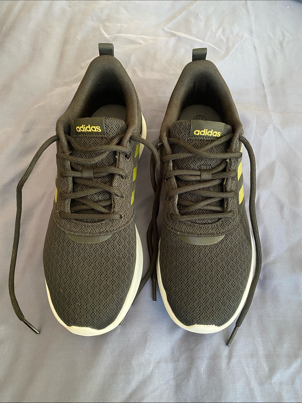 adidas Women’s Black Athletic Sneakers with Gold Accents